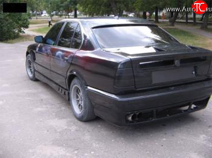 4 999 р. Накладка на задний бампер Rieger BMW 5 серия E34 седан дорестайлинг (1988-1994)  с доставкой в г. Новочеркасск