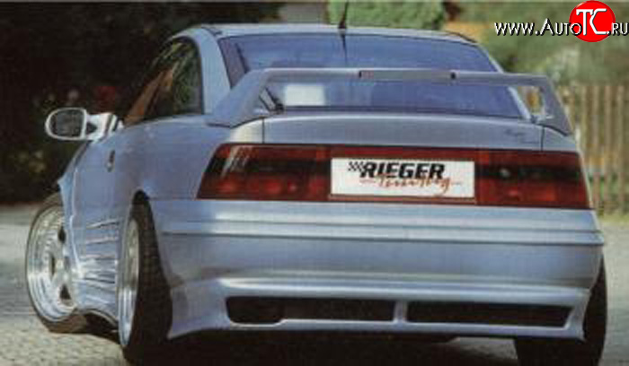 4 499 р. Накладка заднего бампера Rieger Opel Calibra A (1990-1997)  с доставкой в г. Новочеркасск