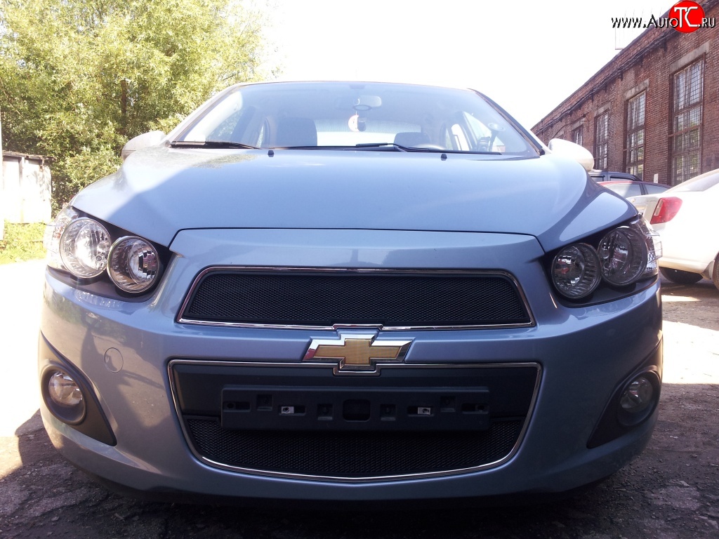 1 469 р. Нижняя сетка на бампер Russtal (черная) Chevrolet Aveo T300 седан (2011-2015)  с доставкой в г. Новочеркасск