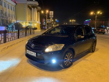 1 829 р. Дефлектор капота CA-Plastiс Toyota Auris E150 хэтчбэк 5 дв. рестайлинг (2010-2012) (Classic черный, Без надписи)  с доставкой в г. Новочеркасск. Увеличить фотографию 2