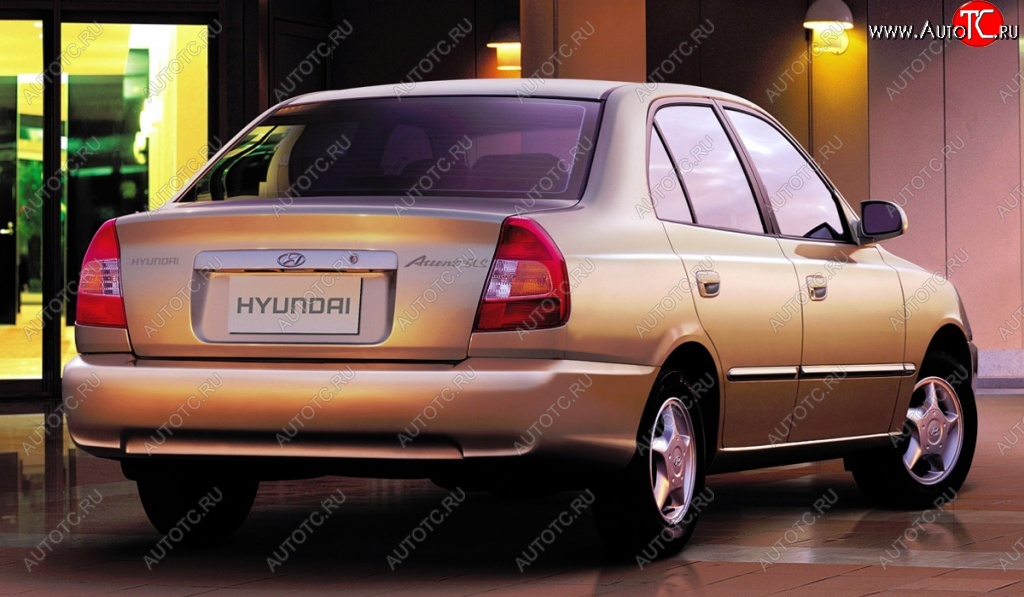 4 899 р. Задний бампер Стандартный Hyundai Accent седан ТагАЗ (2001-2012) (Неокрашенный)  с доставкой в г. Новочеркасск