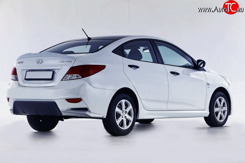 13 499 р. Задний бампер Sport Hyundai Solaris RBr седан дорестайлинг (2010-2014) (Неокрашенный)  с доставкой в г. Новочеркасск