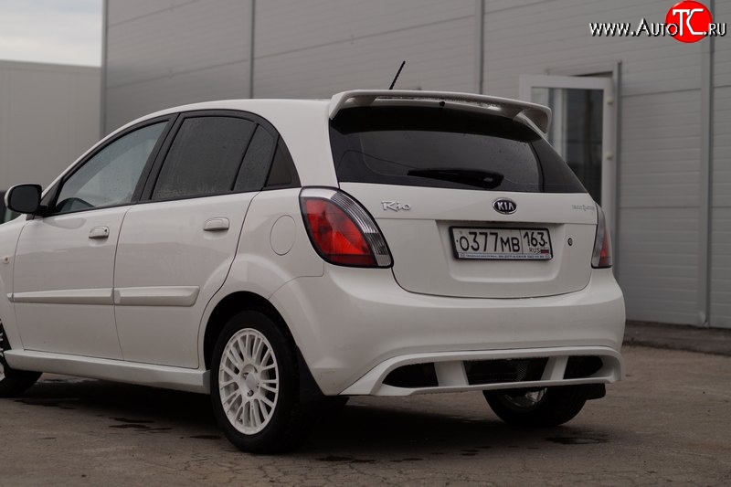 5 899 р. Накладка заднего бампера Vita Dm  KIA Rio ( 2 JB,  4 FB) (2005-2024) дорестайлинг, хэтчбэк 5 дв., рестайлинг, хэтчбэк 5 дв., рестайлинг седан (Неокрашенная)  с доставкой в г. Новочеркасск