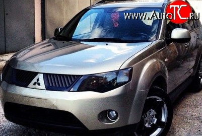 1 529 р. Темная защита передних фар SIM Mitsubishi Outlander XL (CW)  дорестайлинг (2005-2009)  с доставкой в г. Новочеркасск