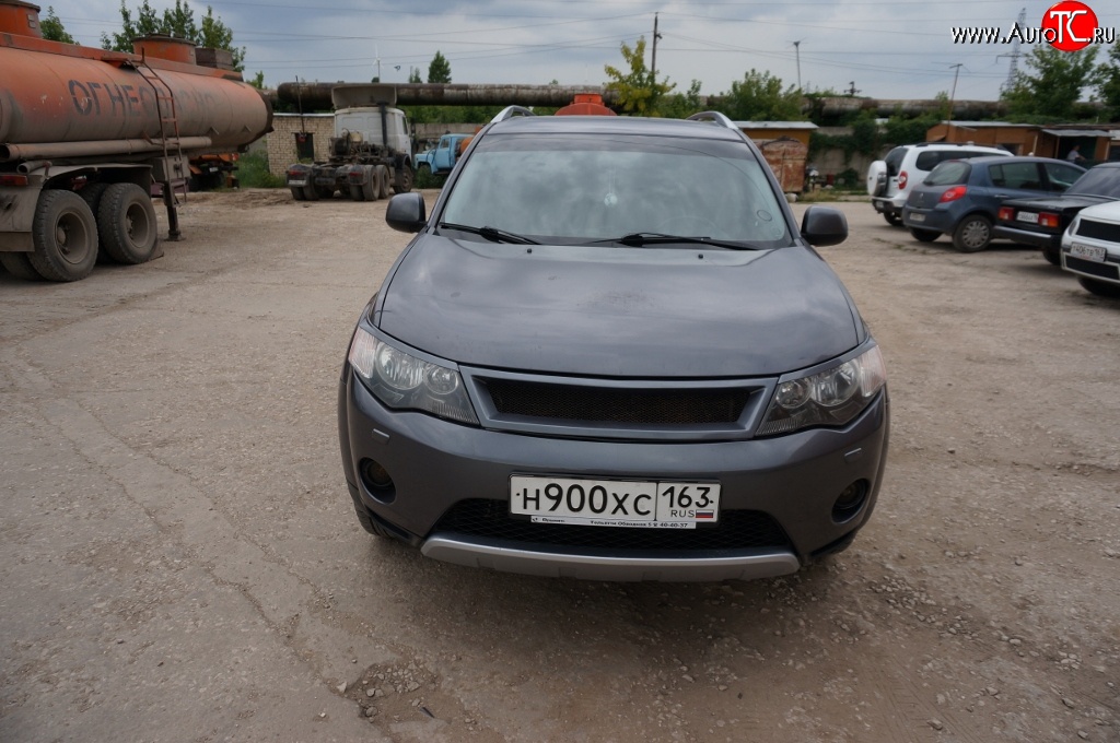 5 449 р. Решётка радиатора (рестайлинг) Sport Mitsubishi Outlander XL (CW)  рестайлинг (2010-2013) (Неокрашенная)  с доставкой в г. Новочеркасск