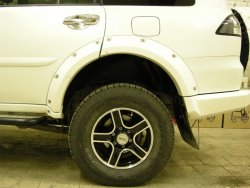 15 349 р. Накладки на колёсные арки BUSHWACKER Mitsubishi Pajero Sport PB дорестайлинг (2008-2013) (Неокрашенные)  с доставкой в г. Новочеркасск. Увеличить фотографию 3