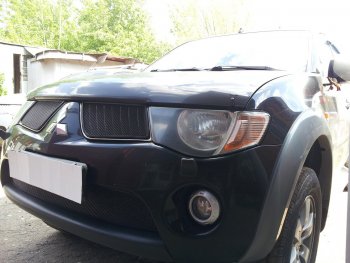 3 099 р. Защитная сетка в бампер (низ, ячейка 3х7 мм) Alfeco Стандарт  Mitsubishi L200  4 (2006-2014)  дорестайлинг (Чёрная)  с доставкой в г. Новочеркасск. Увеличить фотографию 2